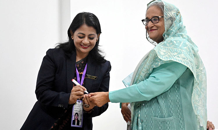 Bangladesh's PM Hasina celebrates 'absolute victory' after polls without opposition