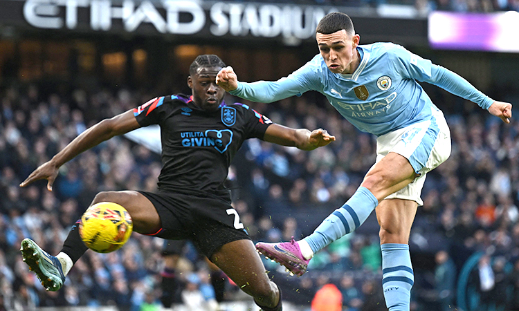 Foden double fires City to 5-0 FA Cup win over Huddersfield