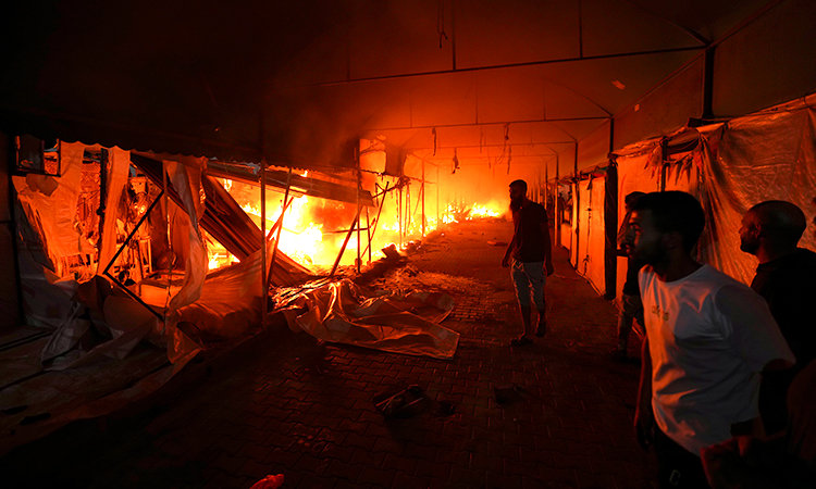 Israeli strike on hospital tent camp kills 4; ignites a fire that burns dozens