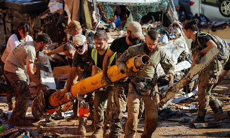 Spain deploys more troops for flood rescue as death toll reaches 214