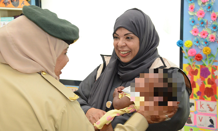 Dubai Police's 'Winter Clothing' initiative brings joy to children of inmates