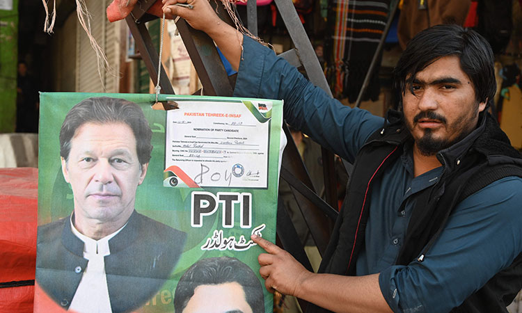 With over 100 seats counted, Imran Khan's supporters lead in Pakistan