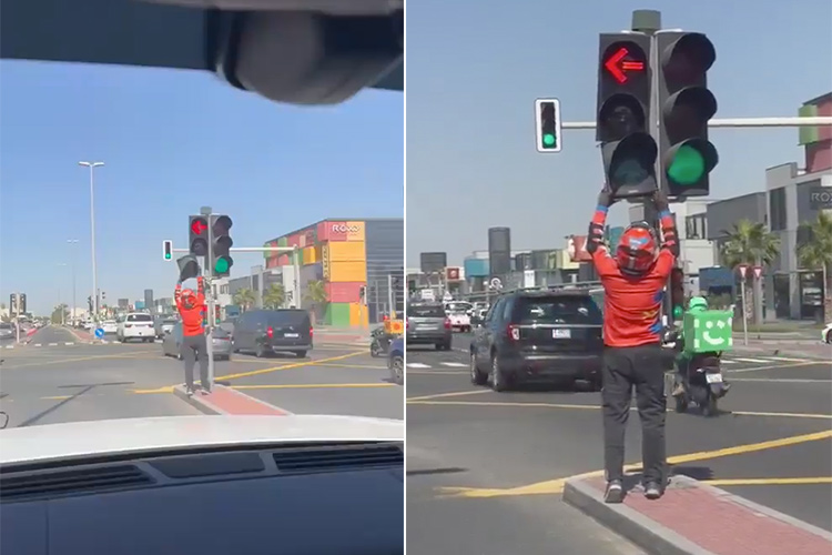 VIDEO: Food delivery driver awarded for fixing a traffic signal in Dubai