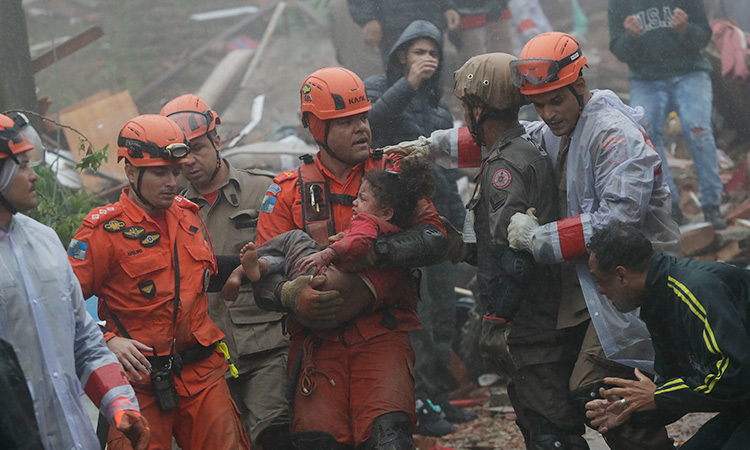 4-year-old rescued after 16 hours under mud as Brazil storms kill at least 20