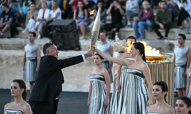 Greece hands Olympic flame to 2024 Paris Games hosts