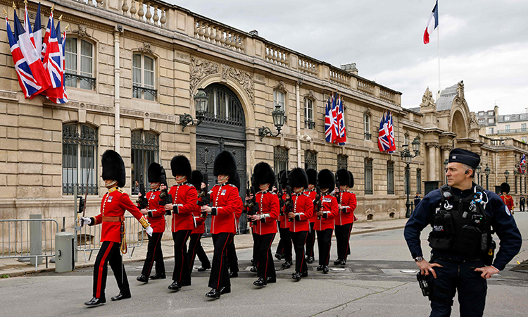 UK, French troops march in historic parades