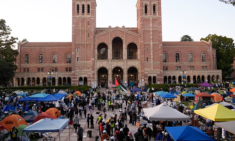 Police arrest dozens as they break up pro-Palestinian protests at several US universities