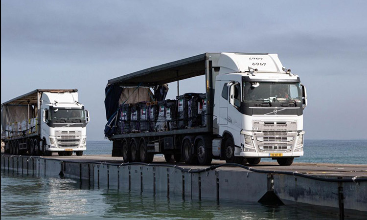 Food piles up at Gaza crossing as aid agencies say unable to work