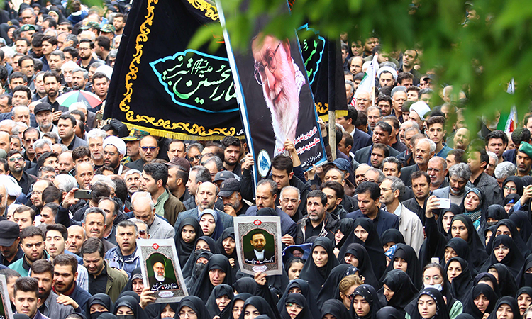 Tens of thousands gather for Raisi funeral procession in Tehran