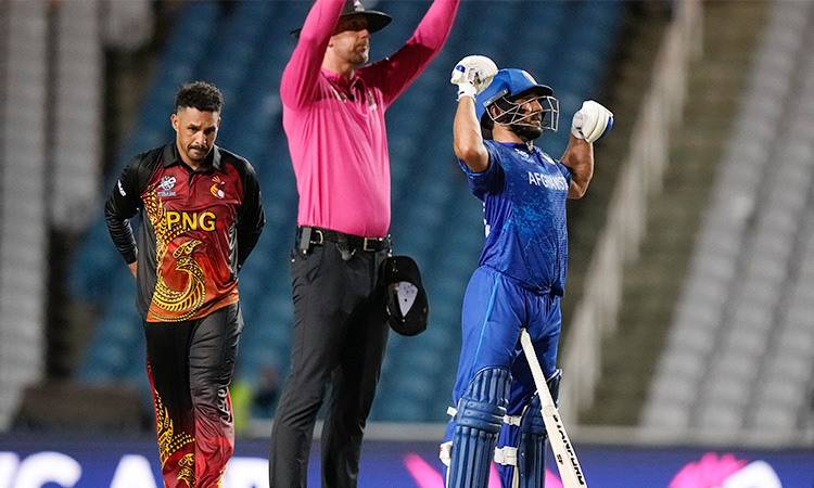 Afghanistan beat PNG to advance at T20 World Cup as New Zealand eliminated