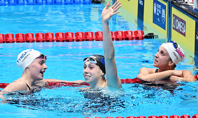 Walsh sets 100m fly record as Ledecky books Olympic berth