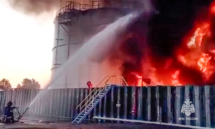 Fire at drone-hit Russian oil depot rages for second day