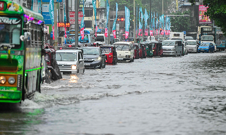 Sri Lanka monsoon floods kill 14, schools shut