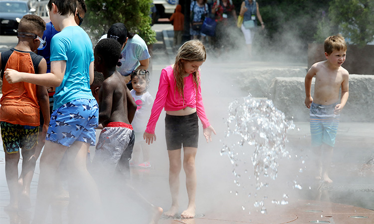 Millions sweltering under extreme heat worldwide as summer arrives 