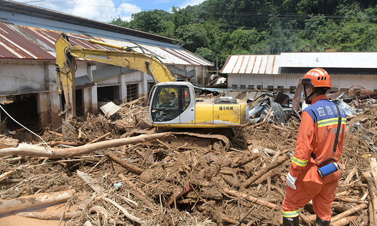 Historic flooding in southern China kills 47