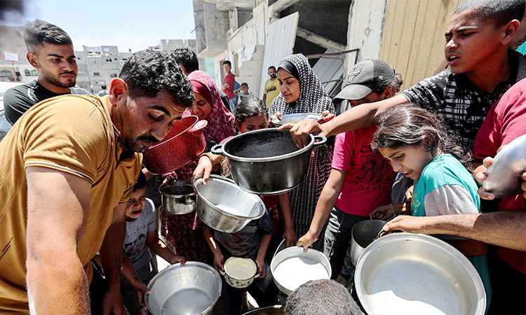 Food piles up at Gaza crossing as aid agencies say unable to work