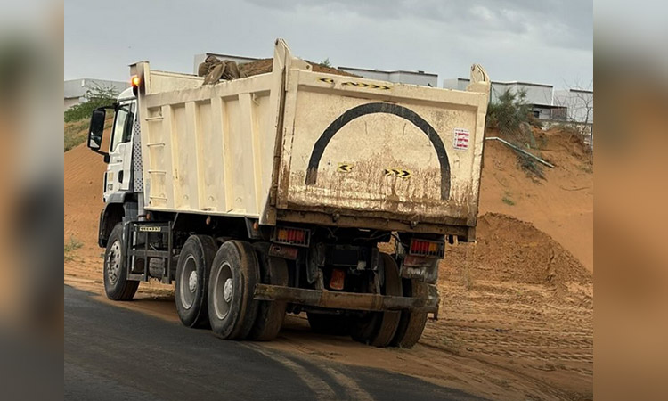 Ajman seizes trucks for transporting sand without permit