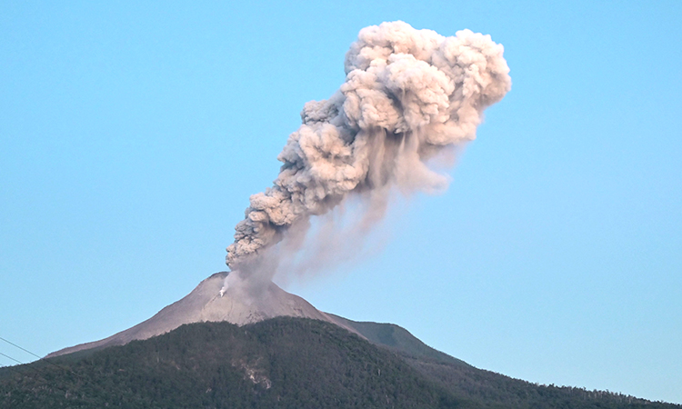 Indonesia’s Mt Ibu volcano erupts, spewing clouds of ash