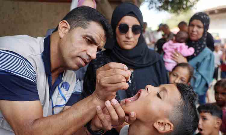 Parents in war-torn Gaza rush to vaccinate children against polio