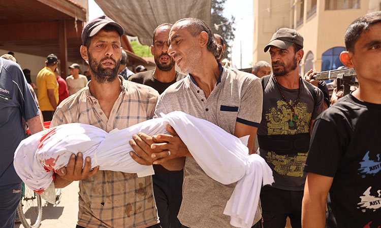 Israeli strike on school-turned-shelter kills 13 children and 6 women, including one pregnant