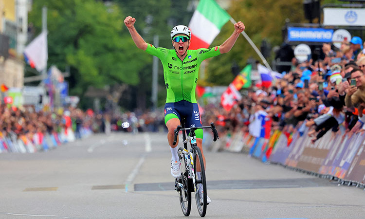 Pogacar wins world road race completes triple crown