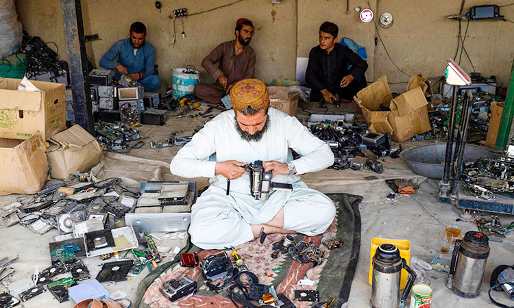 Treasure in trash: Afghans hunt for gold in discarded electronics