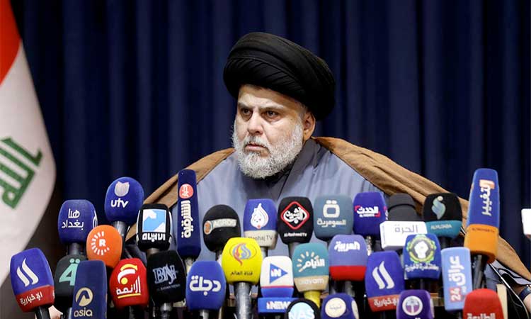 Iraqi cleric Sadr quits politics, supporters storm government palace 