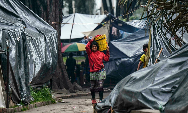 Refugee camp in Bogota park evokes pain of conflict