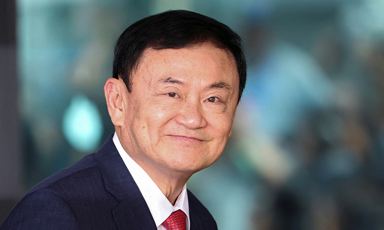 Just freed Thaksin may still face a royal defamation charge