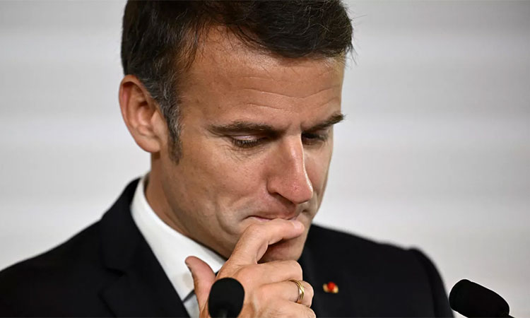 Macron caught between a rock and a hard place