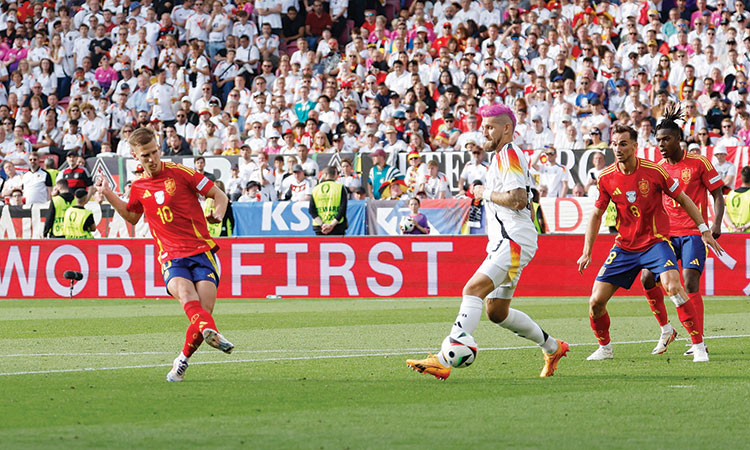 Spain edge past Germany  in extra time to reach semis